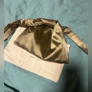 Merit/Tove limited edition bag. It has a magnetic closure. Dust bag included.